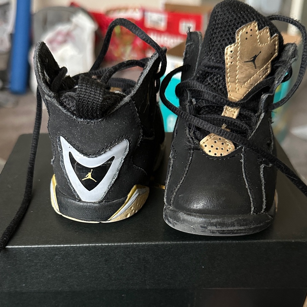 Jordan Kids Black and Gold Sneakers